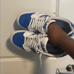 New Balance White and Blue Sneakers